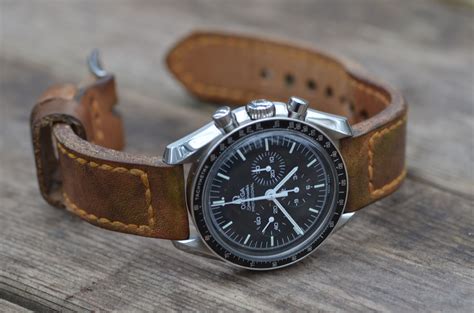 speedmaster brown leather strap.